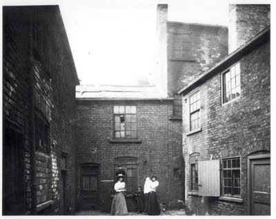 Two Women Pose with Their Children, Eagle and Child Yard, Hunslet, Leeds, 13th May 1896 by English Photographer